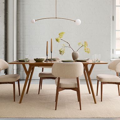 Modern family dining nearby with durable and scratch-resistant wood