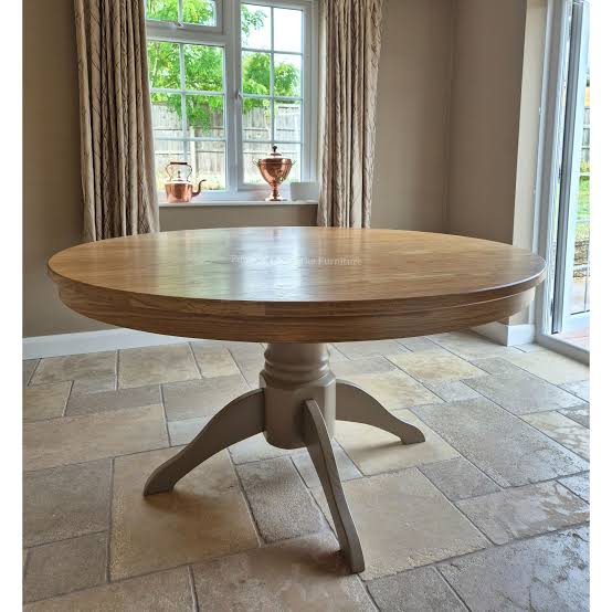 Quality round dining tables in Karachi with pedestal and leg bases